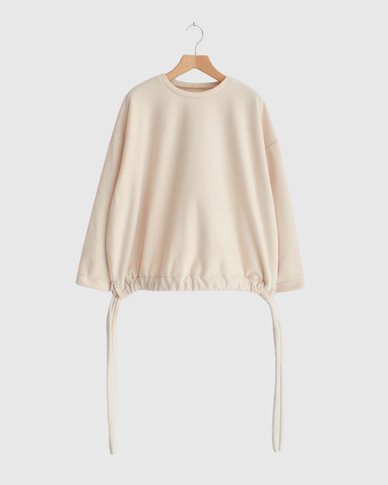 Fleece hem ribbon pullover in Milk