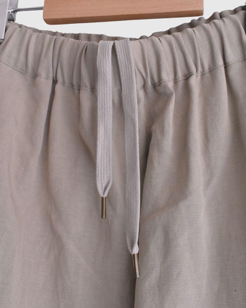 Wide Tuck Shorts in Beige