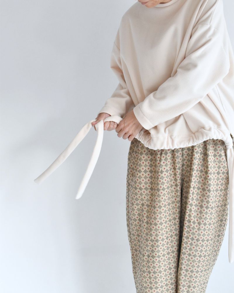 Fleece hem ribbon pullover in Milk
