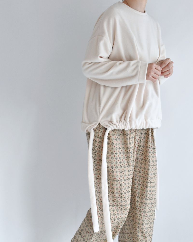Fleece hem ribbon pullover in Milk